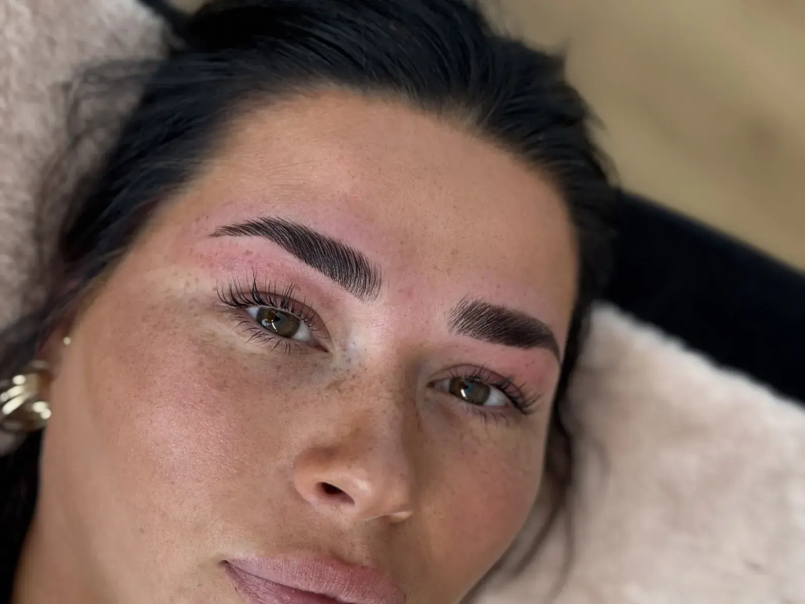 Brow lamination and tint result — fluffy, lifted brows