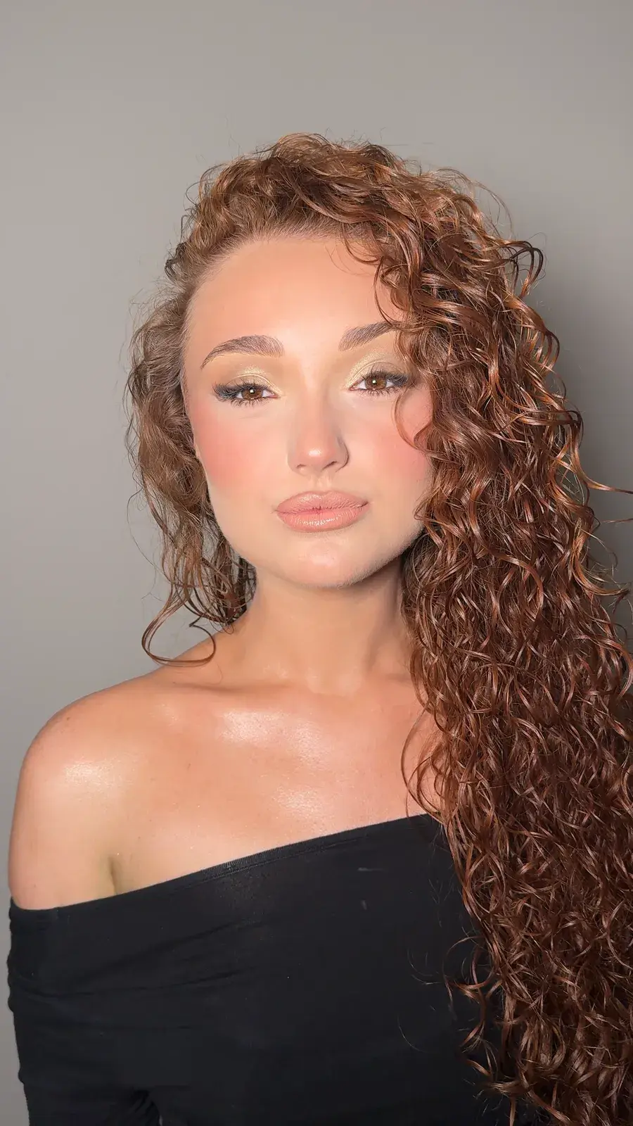 Radiant glam makeup with defined brows